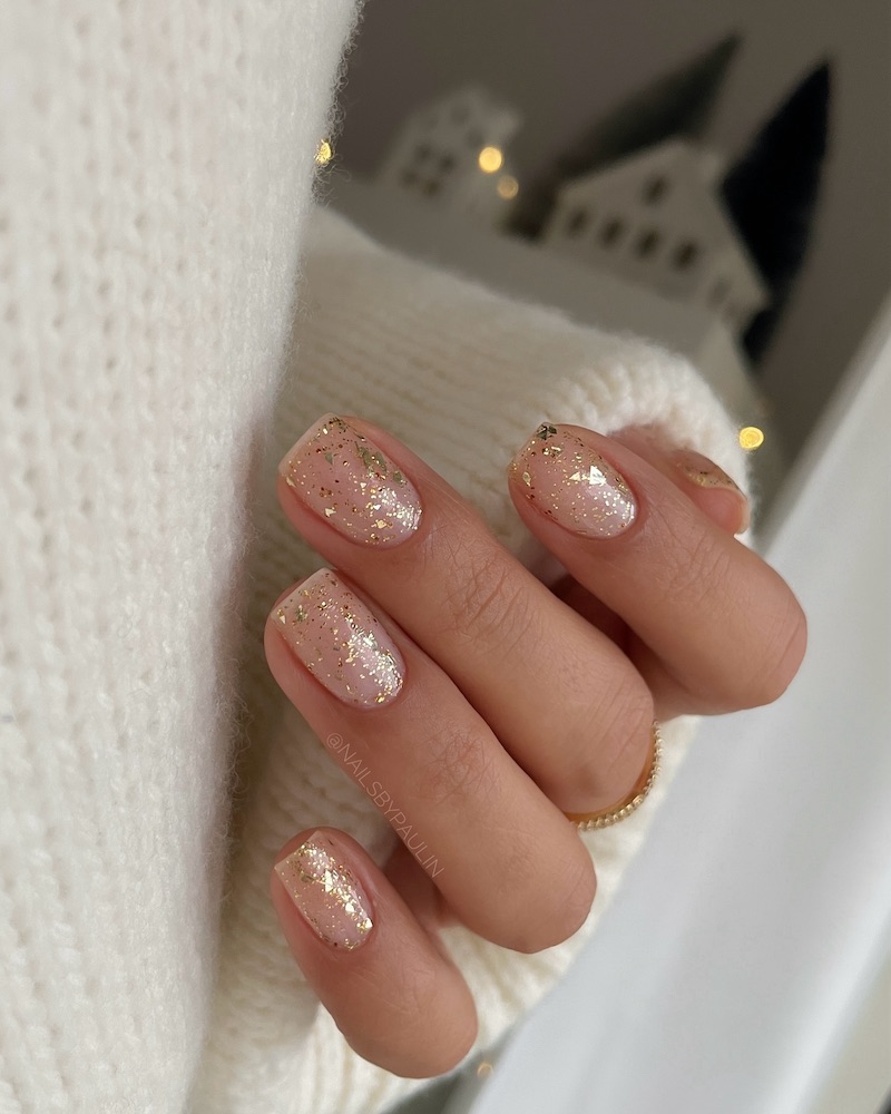 Square nude nails with gold flakes nail design