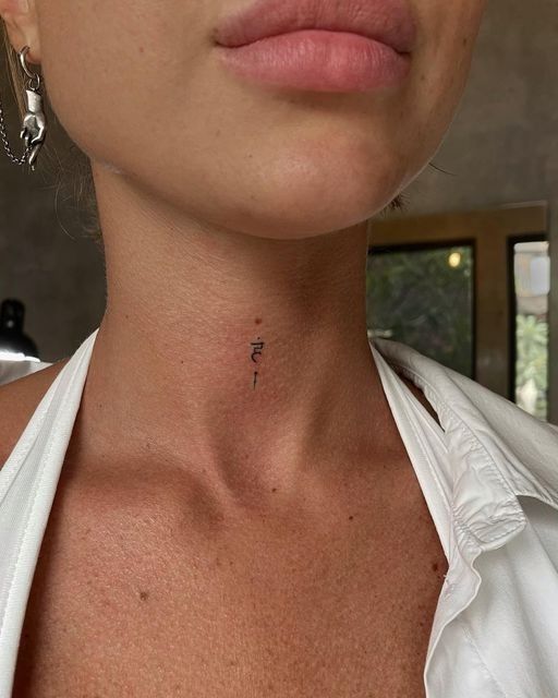minimalist neck tattoo